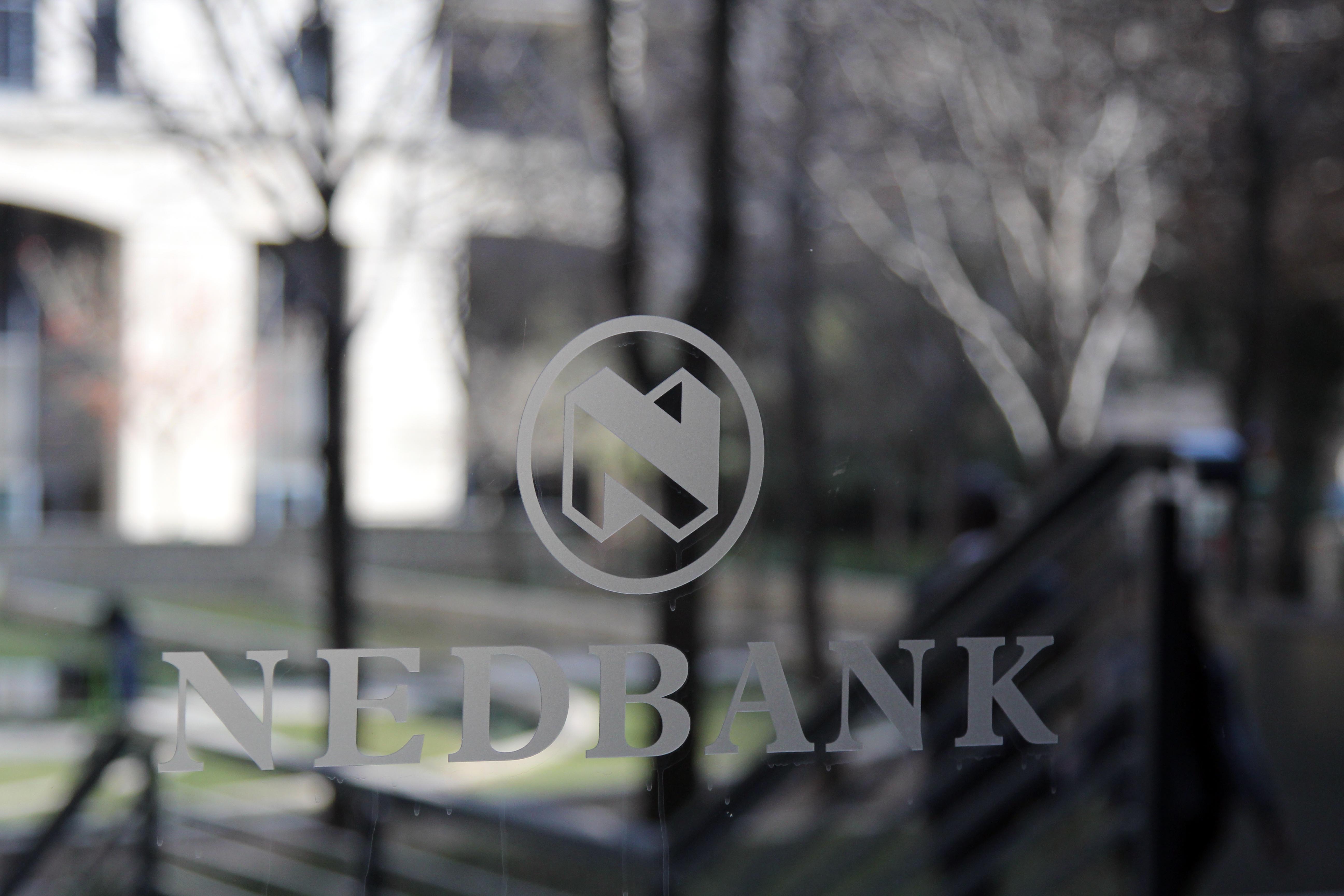 Nedbank first-half profit edges higher