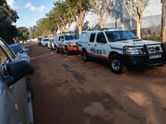 Metro police vehicles parked in front of Century Properties's student housing project on Wednesday. Picture: Supplied