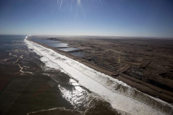 Former open pit diamond mines line the Atlantic shoreline on Namibia's southern Coast. Picture: Simon Dawson/Bloomberg