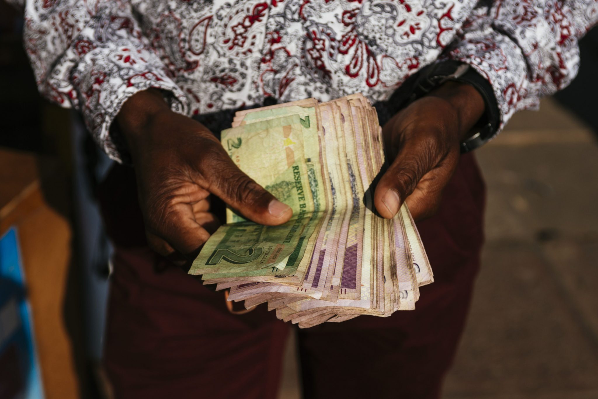 Zimbabwe capital approves use of local currency to pay services - Moneyweb