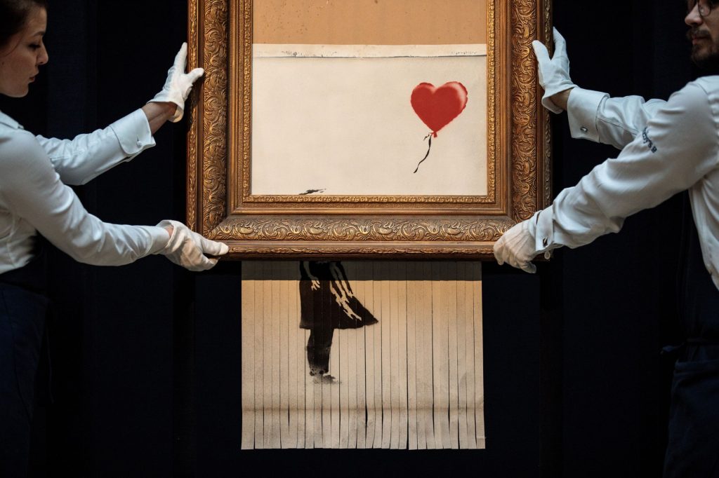 Shredded Banksy painting sells for record-setting $25.4m - Vimarsana News