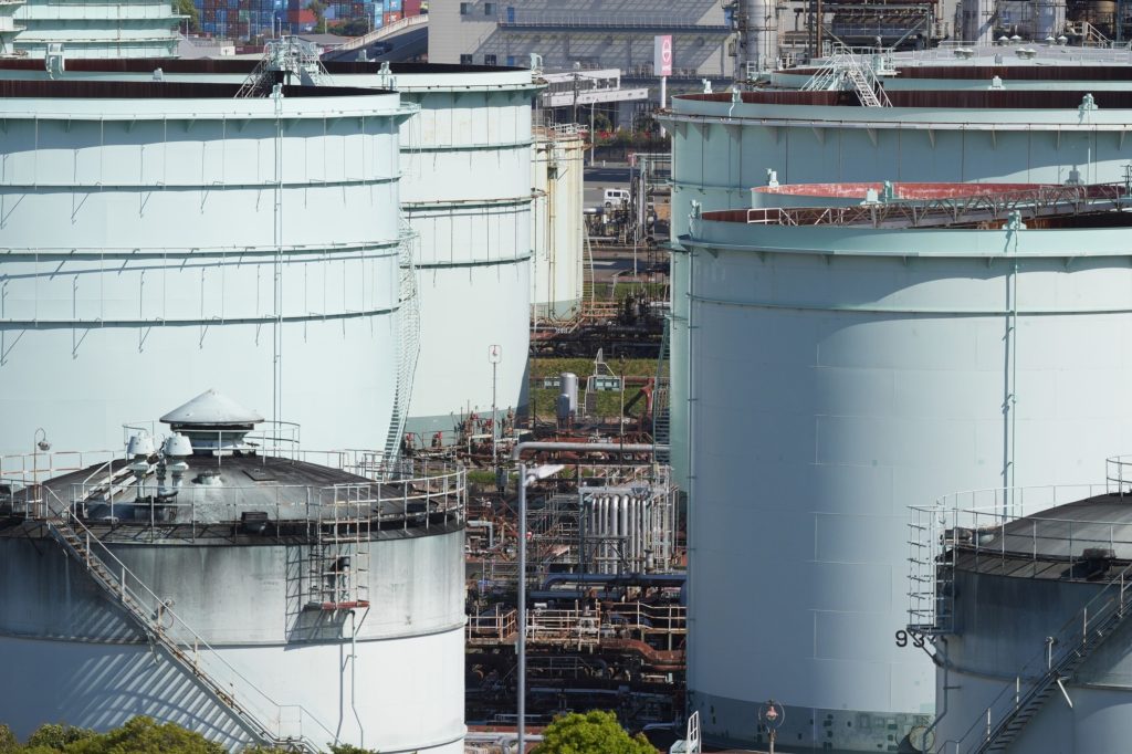 Oil edges higher on debt-deal progress, China factory activity - Vimarsana News