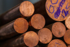 Copper hits highest in over a year on disruptions, Fed outlook