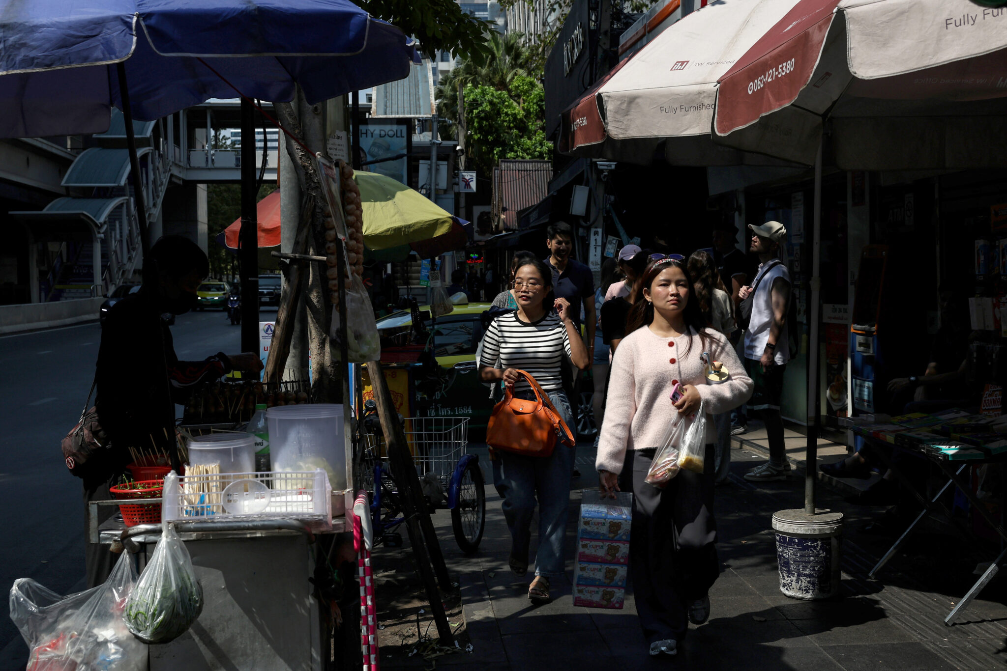Emerging market stocks, currencies rise as Fed hike bets ease